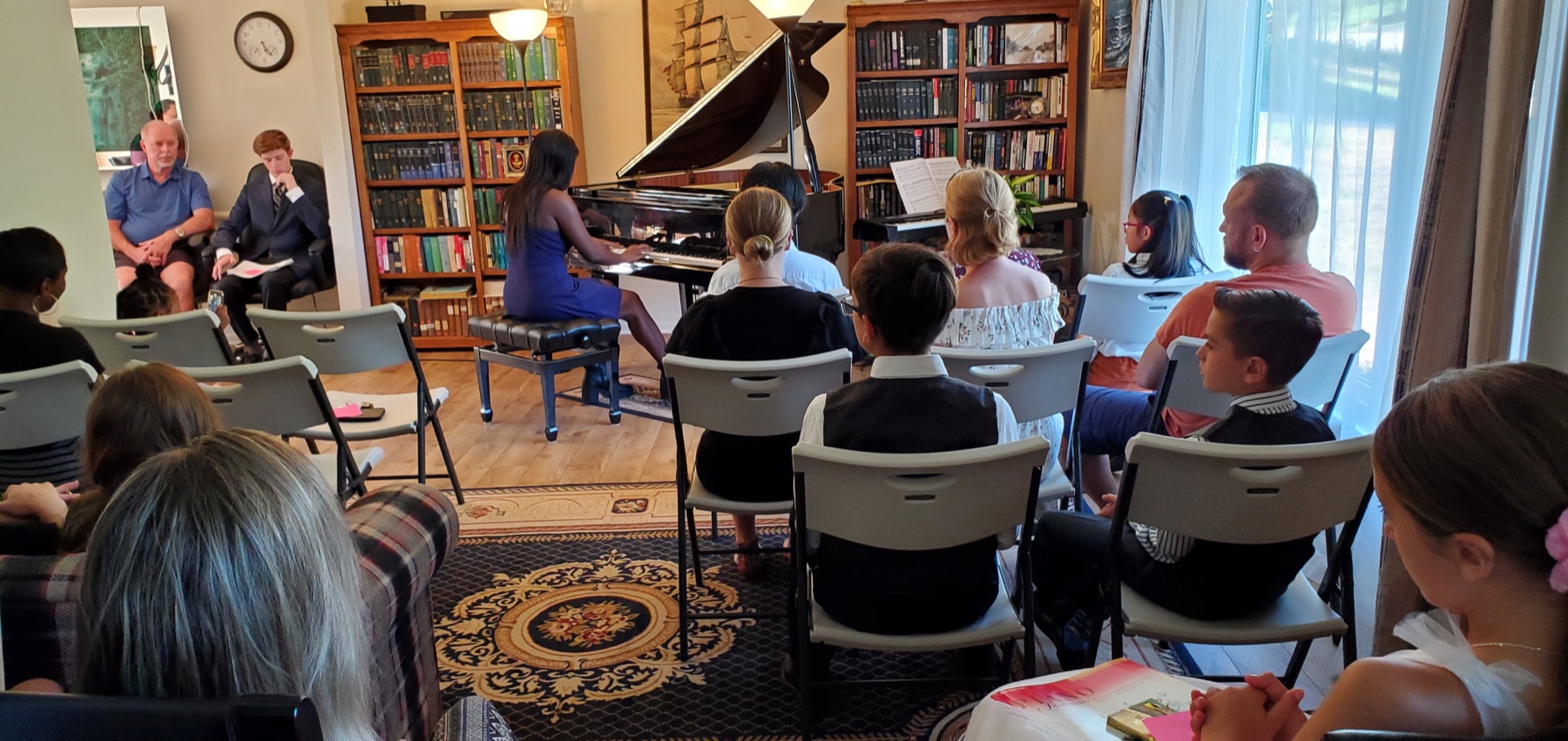 Audience gathered for a student piano concert
