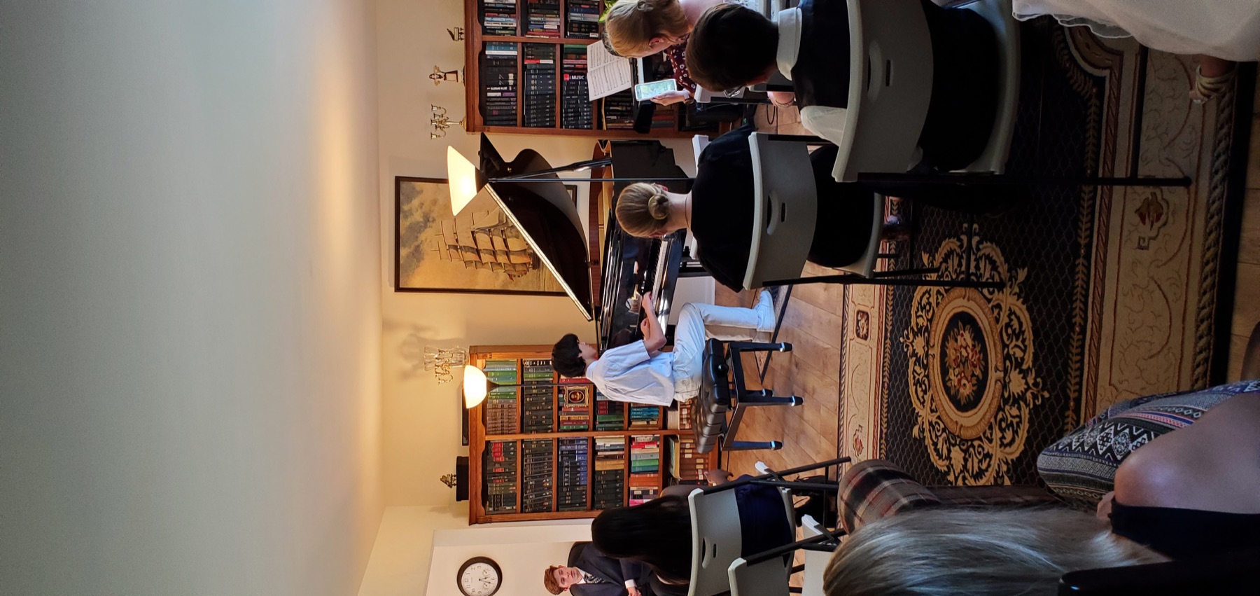 Student pianist performing at a recital